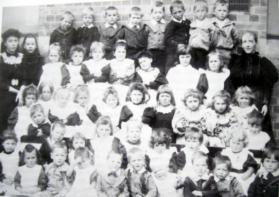 Elizabeth Mason, right, with a class of Badsey School pupils in 1898.