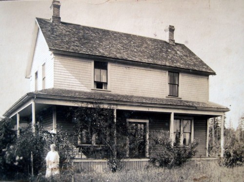 Alice Idiens outside of the family home in Comox, British Columbia, which they named ‘Cotswold Farm’
