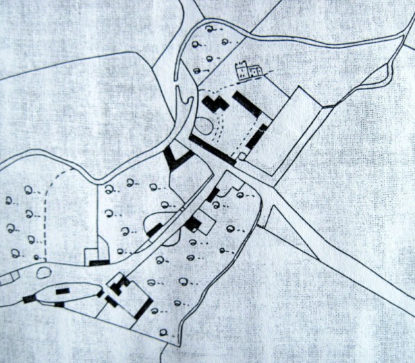 A map from the mid 19th century, with a drawing of the church and showing the location of a range of buildings at the rear of the Manor.