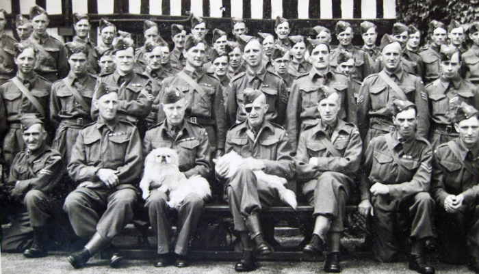 1. The Broadway Company outside Wickhamford Manor.   Major Lees-Milne with eye patch and Lieut Horsfield to his left.  (The date of the picture is not known).