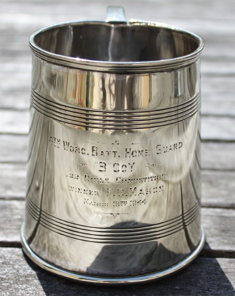 7. A silver tankard awarded to Pte Fred Mason of Wickhamford for his shooting in the .22 competition on 19th March 1944.