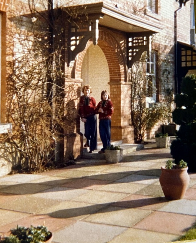 Laura Morris, Albert Newman's granddaughter (right), and a cousin, outside the rarely used front door.