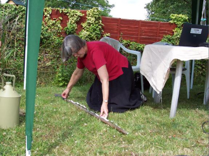 ... whilst Maureen Spinks gets on her hand and knees with a tape measure to record the dimensions