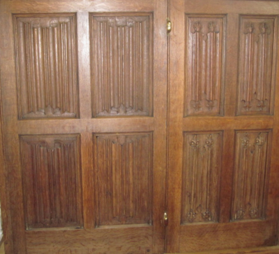 10. Box pew opposite the pulpit with 16th century linenfold panels.