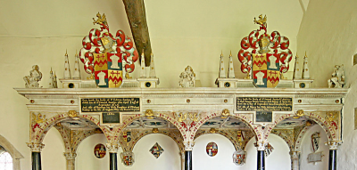 29. The Sandys memorial - top achievements of mantelled arms, obelisks and allegorical figure, probably added to the original tombs in the 1840s.