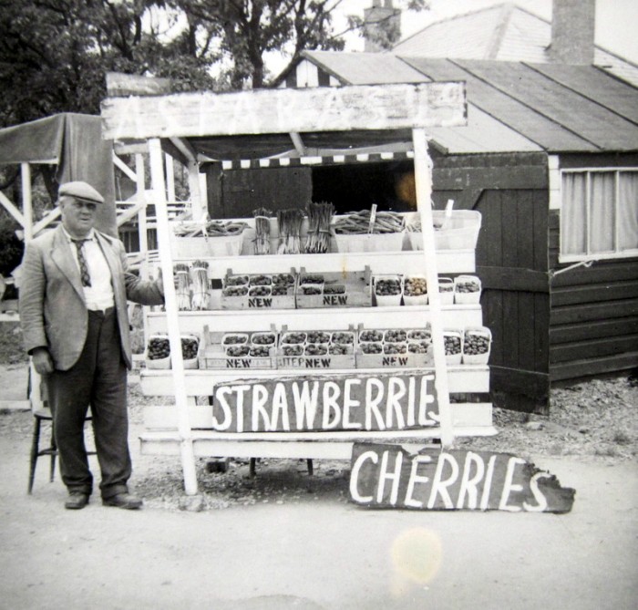 ‘Billie’ Dolphin at his roadside stall selling asparagus, strawberries and cherries.