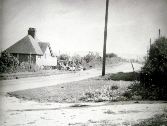 Looking towards Broadway in about 1960, the stall belonged to the Cockbill family.  The site beyond the houses is now Styles Nursery.