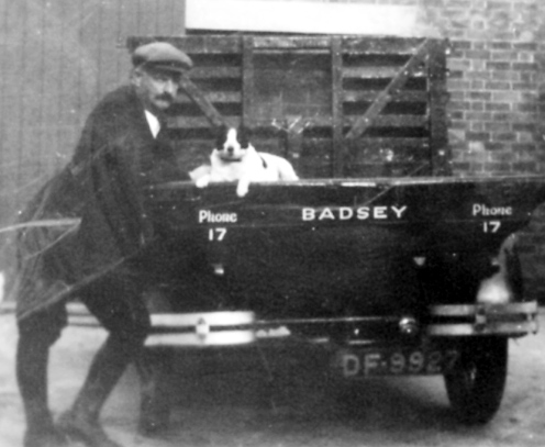 Victor Cockerton, his pickup truck &  favorite dog. Note the phone number 17.