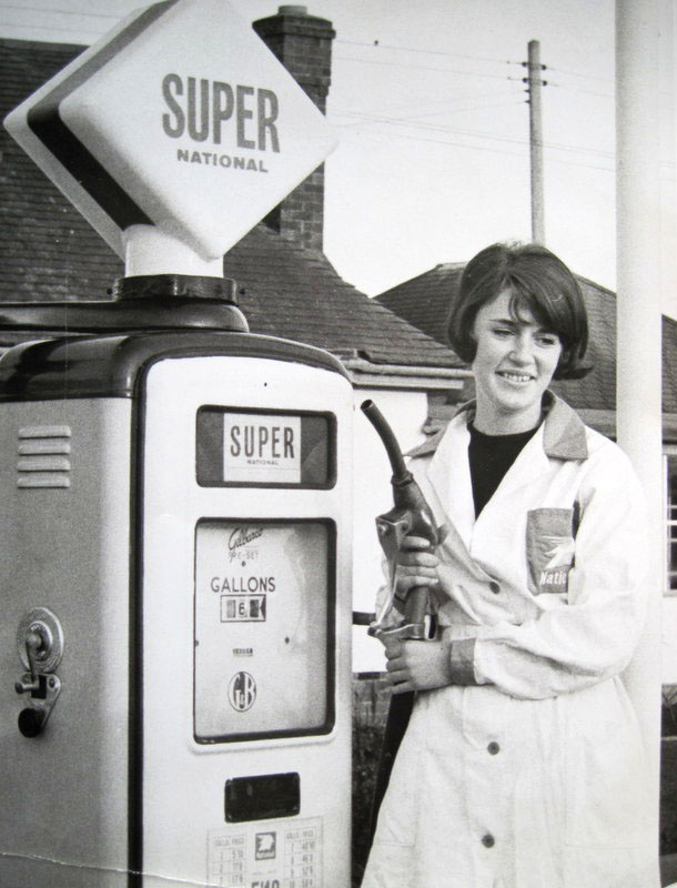 Meryl Peart, daughter of owner, Cyril Peart, operating one of the pumps