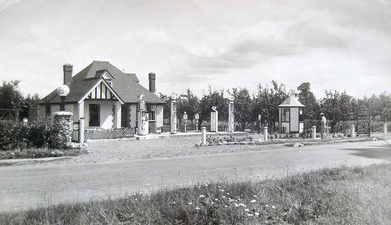 This is earlier than the other photos Pam Corbett gave us. The garage looks less developed. There is no tea room and the land to the right side looks like orcharding.