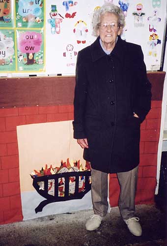 The brightly-coloured fire made by the children of Mrs Cross’ class, brought back memories for Molly Corbett (née Evans), who was a pupil at the school from 1916-1925.