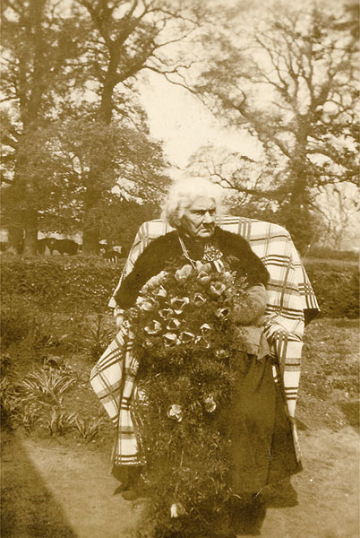 Mrs Dinah Walters with the bouquet presented to her for her 90th birthday.