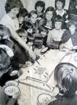 Pam Noyes about to cut the Jubilee cake