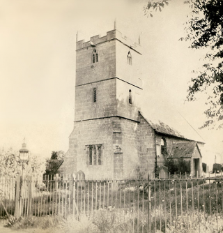 The Church with iron railings and entrance gate.