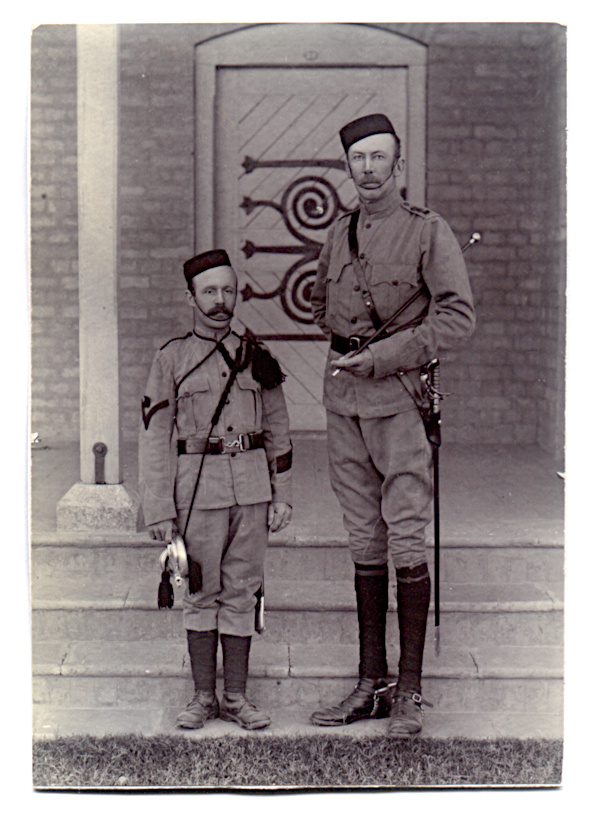 Corporal W.E. Glover (left); Lt Col The Honourable M. Curzon (right)