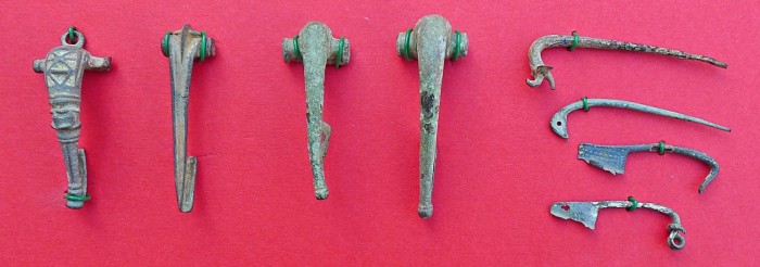 Bronze fibulae and pins