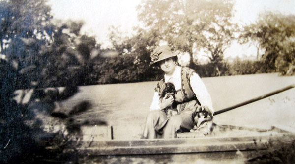 Esther sitting by the sunken garden pond. 