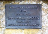 Brass Plaque on gate wall