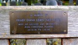 Bronze Plaque on Bench in front of Lynchgate