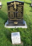 Headstone with vase at base