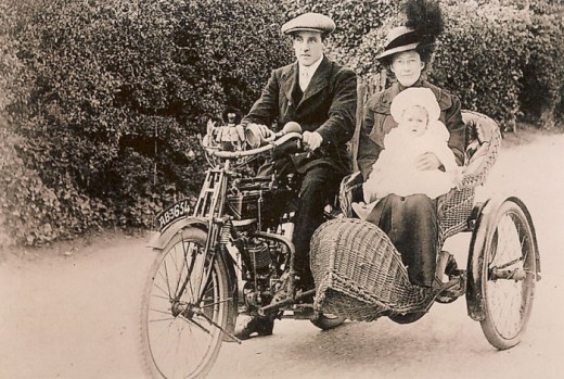 Hall family in motorcycle & sidecar